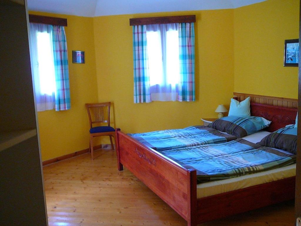 Posteľ alebo postele v izbe v ubytovaní Zöld sziget Apartmanház