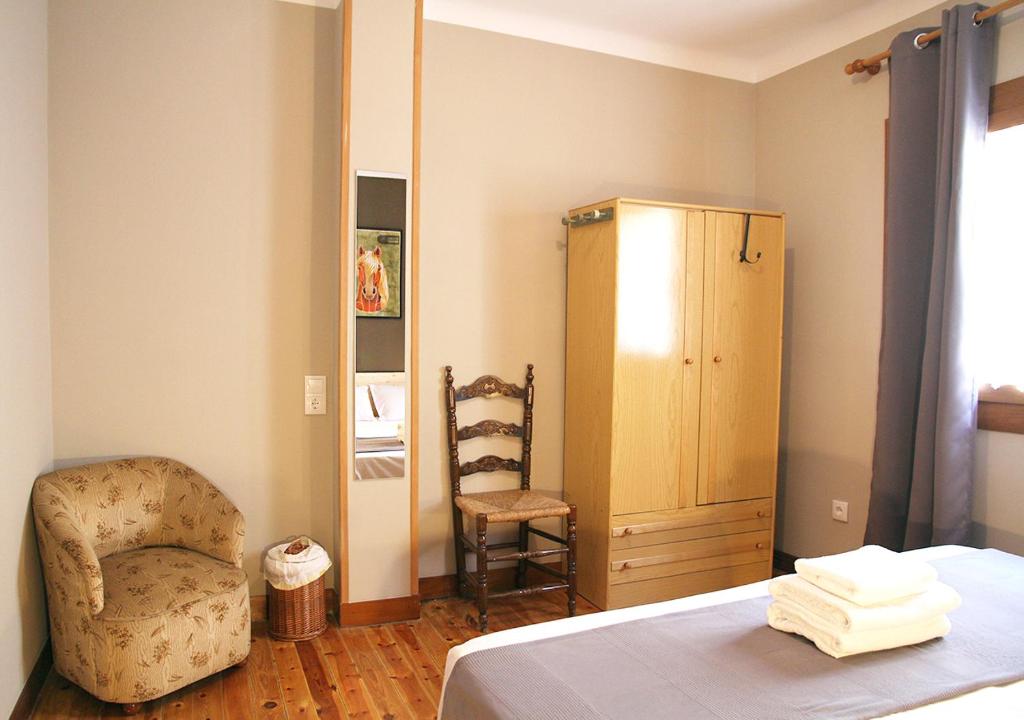 Postel nebo postele na pokoji v ubytování Hostal Fonda Prat