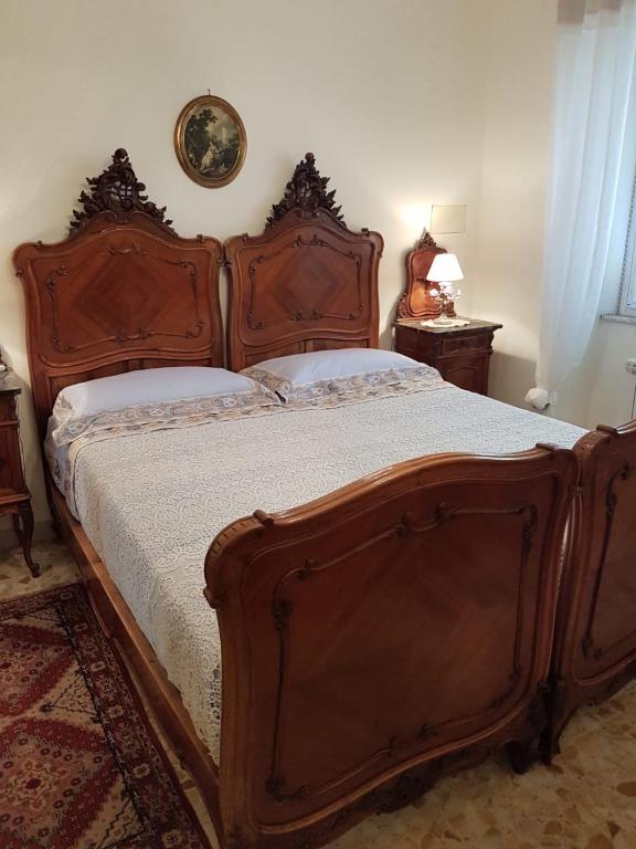 Postel nebo postele na pokoji v ubytování Vecchia Dimora