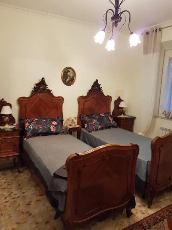 Postel nebo postele na pokoji v ubytování Vecchia Dimora