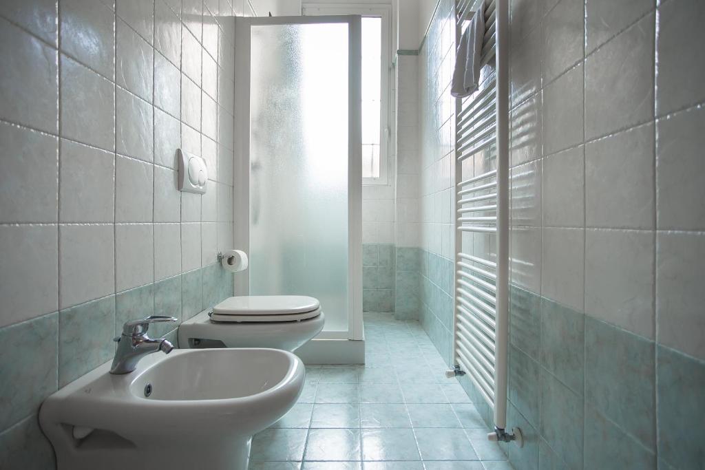 Koupelna v ubytování Hotel Amico