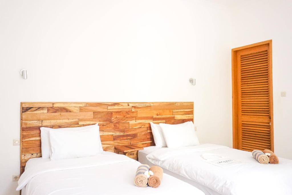 Postel nebo postele na pokoji v ubytování Ibludan Hotel