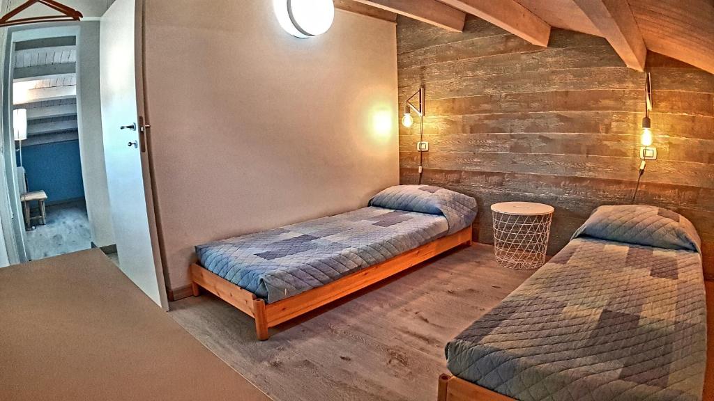 Postel nebo postele na pokoji v ubytování Asinaro Residence - Fronte Mare