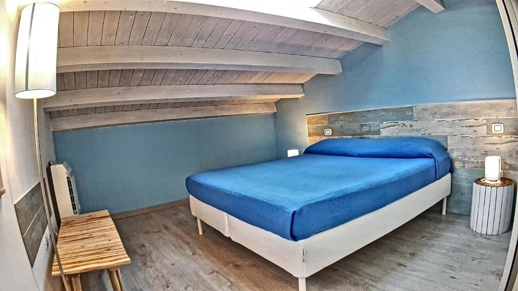 Postel nebo postele na pokoji v ubytování Asinaro Residence - Fronte Mare