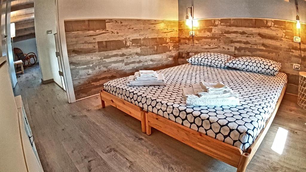 Postel nebo postele na pokoji v ubytování Asinaro Residence - Fronte Mare