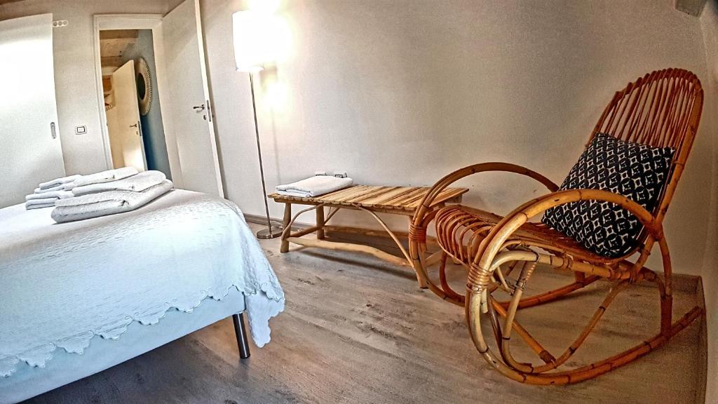 Postel nebo postele na pokoji v ubytování Asinaro Residence - Fronte Mare