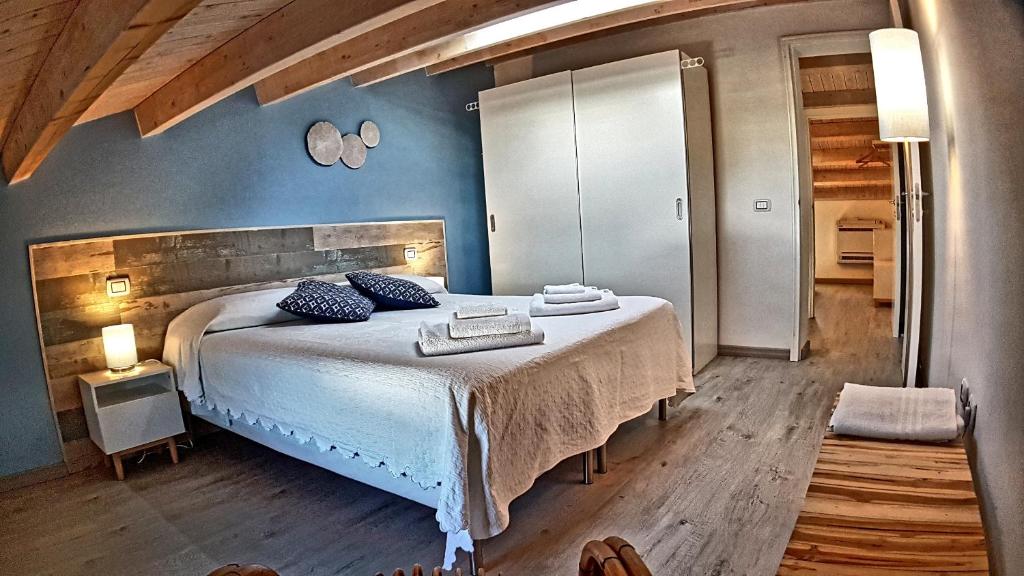 Postel nebo postele na pokoji v ubytování Asinaro Residence - Fronte Mare