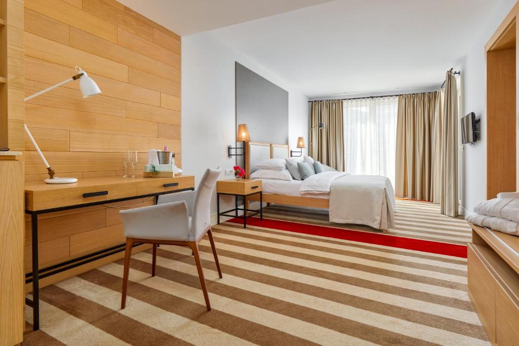 Uma cama ou camas num quarto em Hotel Budva