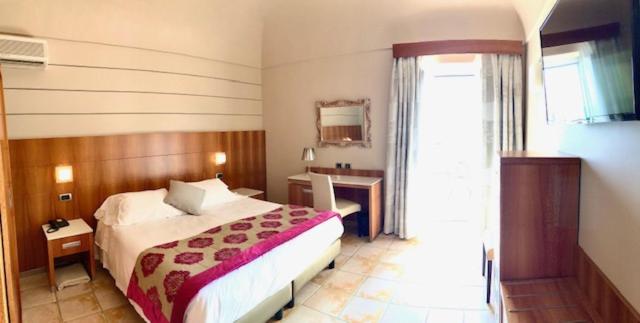 Posteľ alebo postele v izbe v ubytovaní Hotel Ligure
