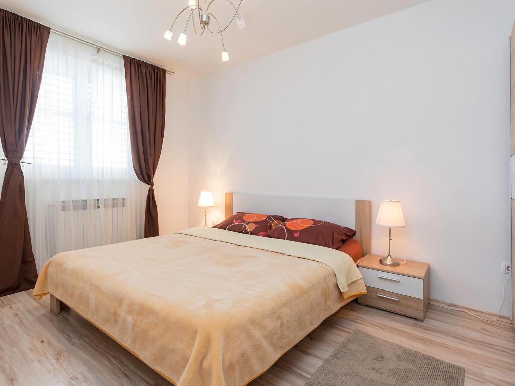 Posteľ alebo postele v izbe v ubytovaní Tasha