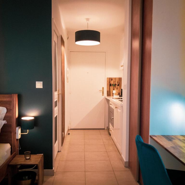Postel nebo postele na pokoji v ubytování Bleu Nuit