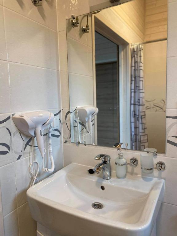 Kúpeľňa v ubytovaní Rainbow Resort