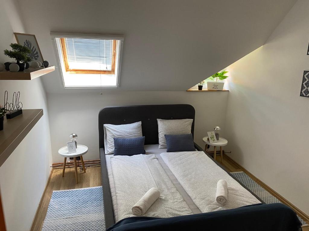Postel nebo postele na pokoji v ubytování Babérsom apartman