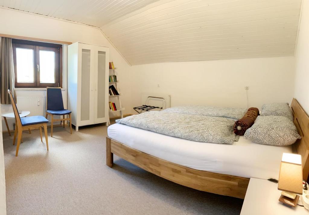 Postel nebo postele na pokoji v ubytování Apartment Sophia - Hallstatt