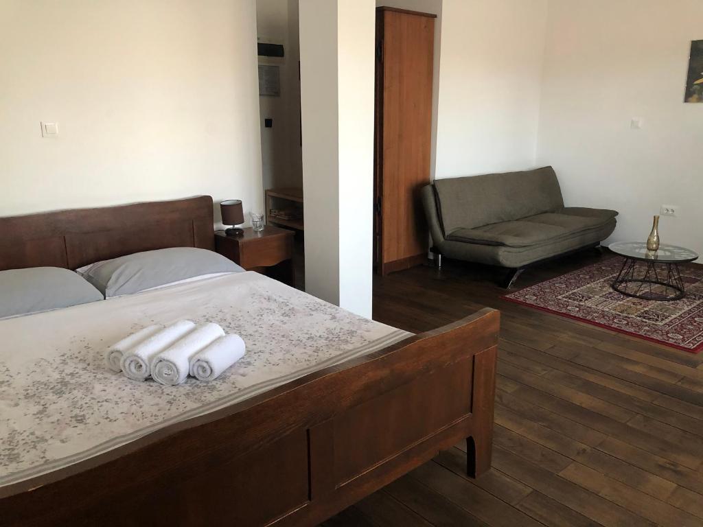 Postel nebo postele na pokoji v ubytování Hotel Lug