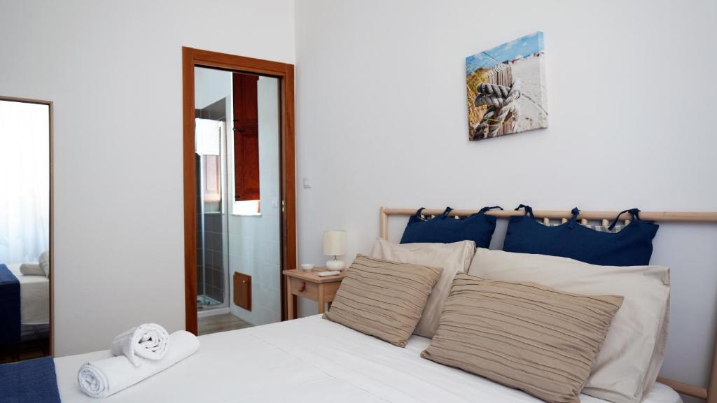 Posteľ alebo postele v izbe v ubytovaní B&B La Veranda