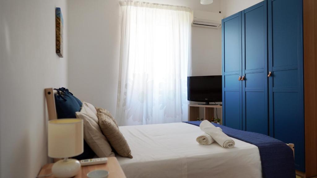 Posteľ alebo postele v izbe v ubytovaní B&B La Veranda