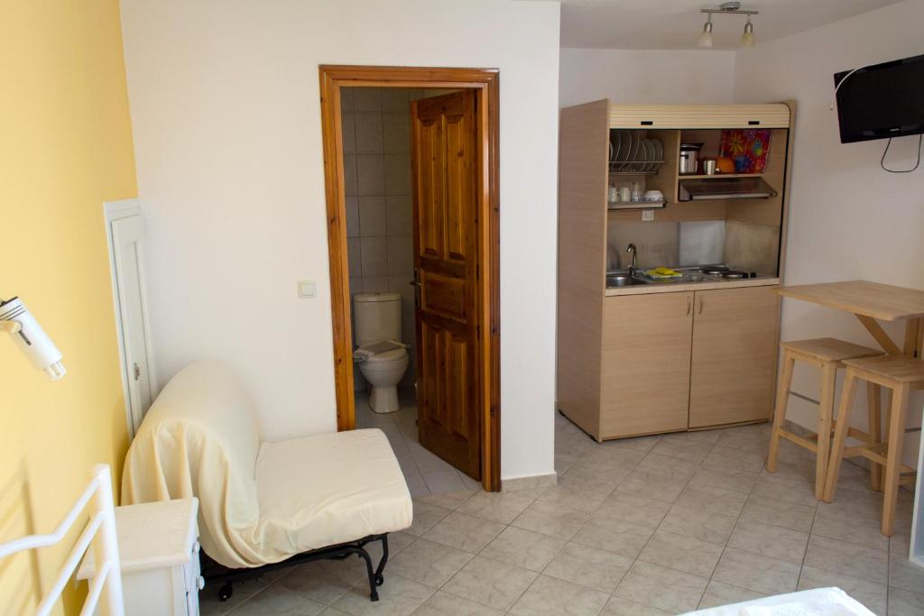 Kuchyň nebo kuchyňský kout v ubytování Villa Molos