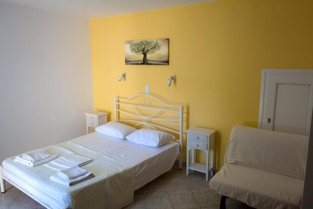 Postel nebo postele na pokoji v ubytování Villa Molos