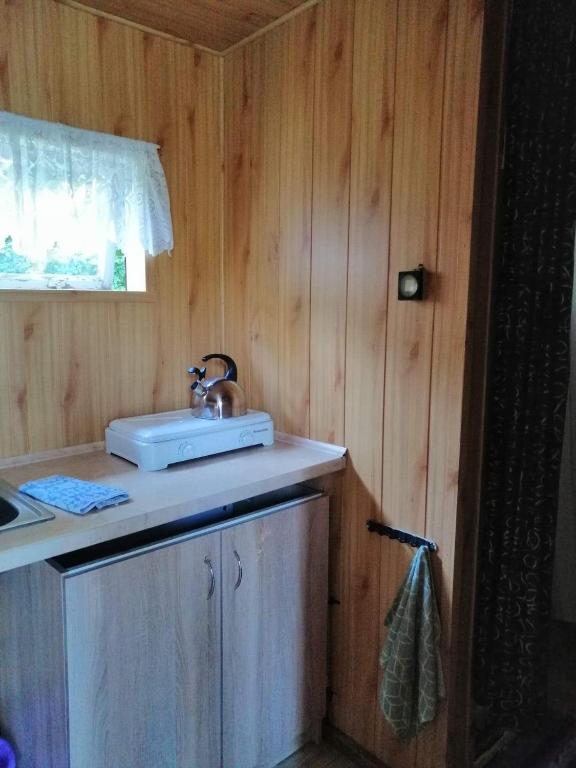 Postel nebo postele na pokoji v ubytování Pod Gwiazdami Lejkowo
