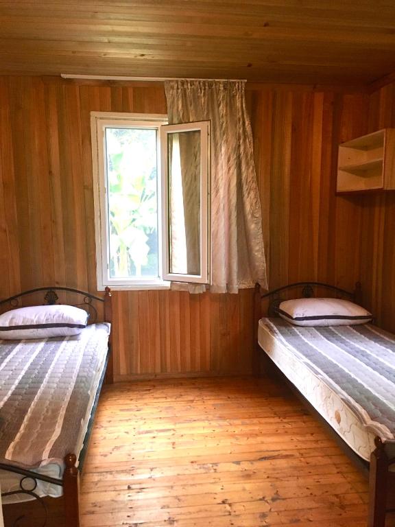 Postel nebo postele na pokoji v ubytování Houses in Gonio-Kvariati economy class