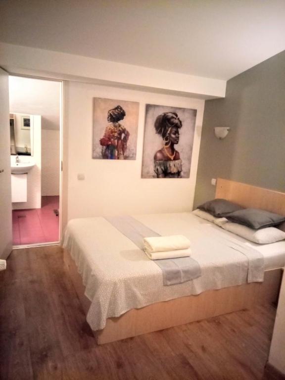 Postel nebo postele na pokoji v ubytování Central Guesthouse