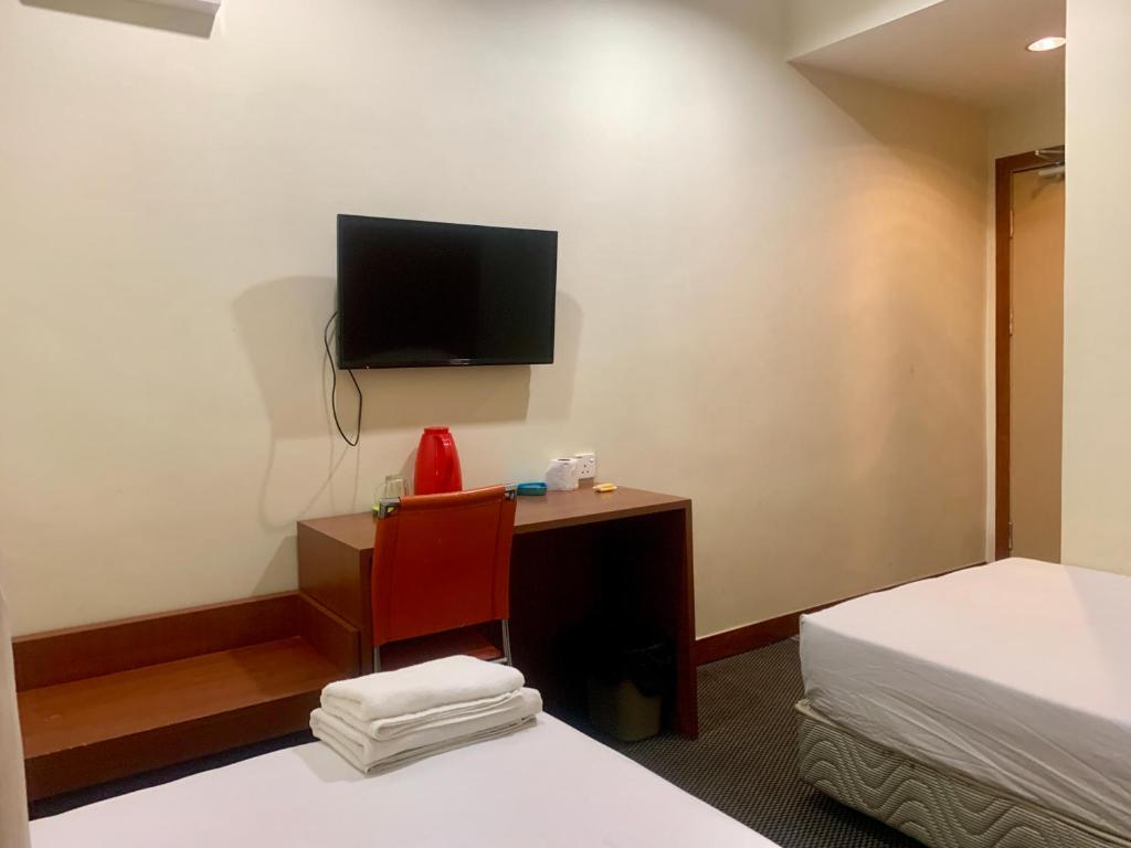 Postel nebo postele na pokoji v ubytování Grand Hotel 2