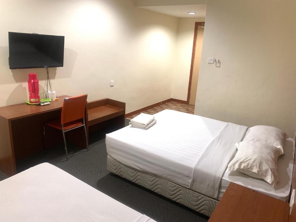 Postel nebo postele na pokoji v ubytování Grand Hotel 2