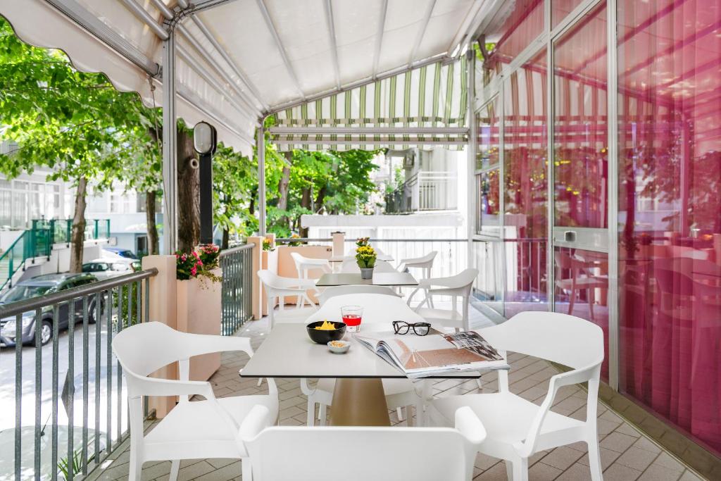 Posezení v ubytování Hotel Très Jolie