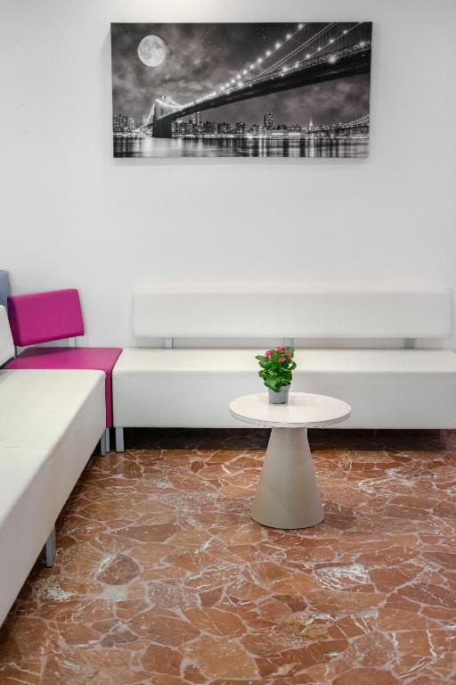 Posezení v ubytování Hotel Très Jolie