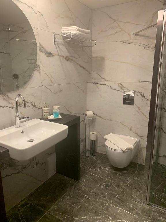 Koupelna v ubytování Tabar Hotel