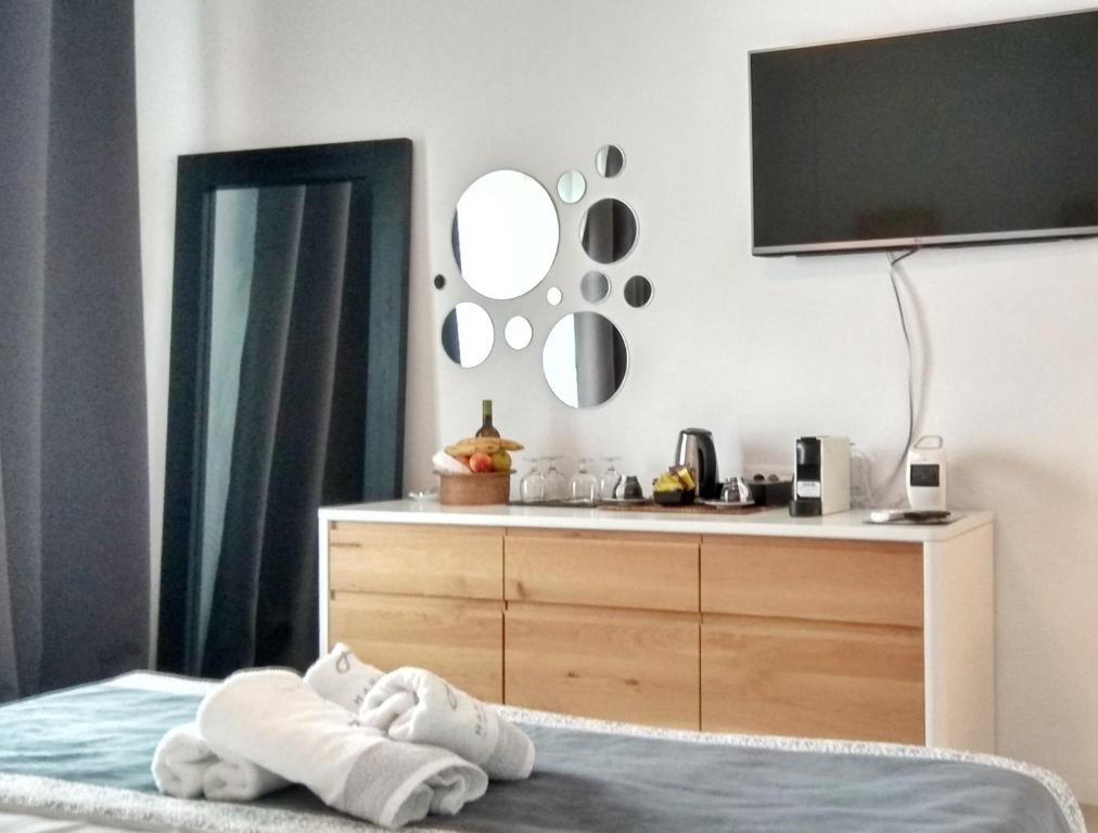 Postel nebo postele na pokoji v ubytování Harmony Boutique Hotel