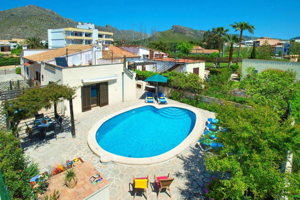 an overhead view of a swimming pool in a resort at Villa Tomeu by Sealand Villas in Port de Pollensa