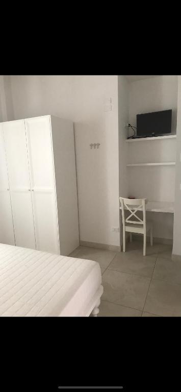 Postel nebo postele na pokoji v ubytování Camere Maré