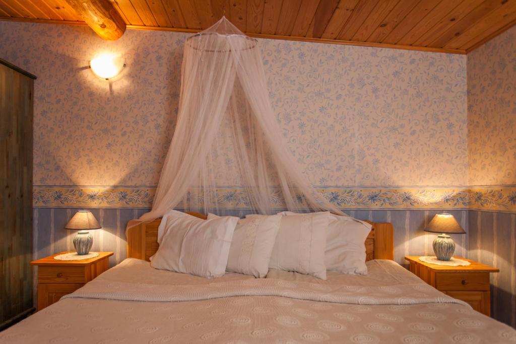 Postel nebo postele na pokoji v ubytování Västriku Holiday Home