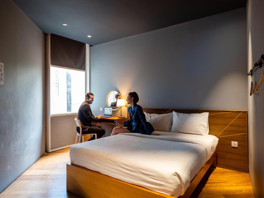 Postel nebo postele na pokoji v ubytování The Bed KLCC