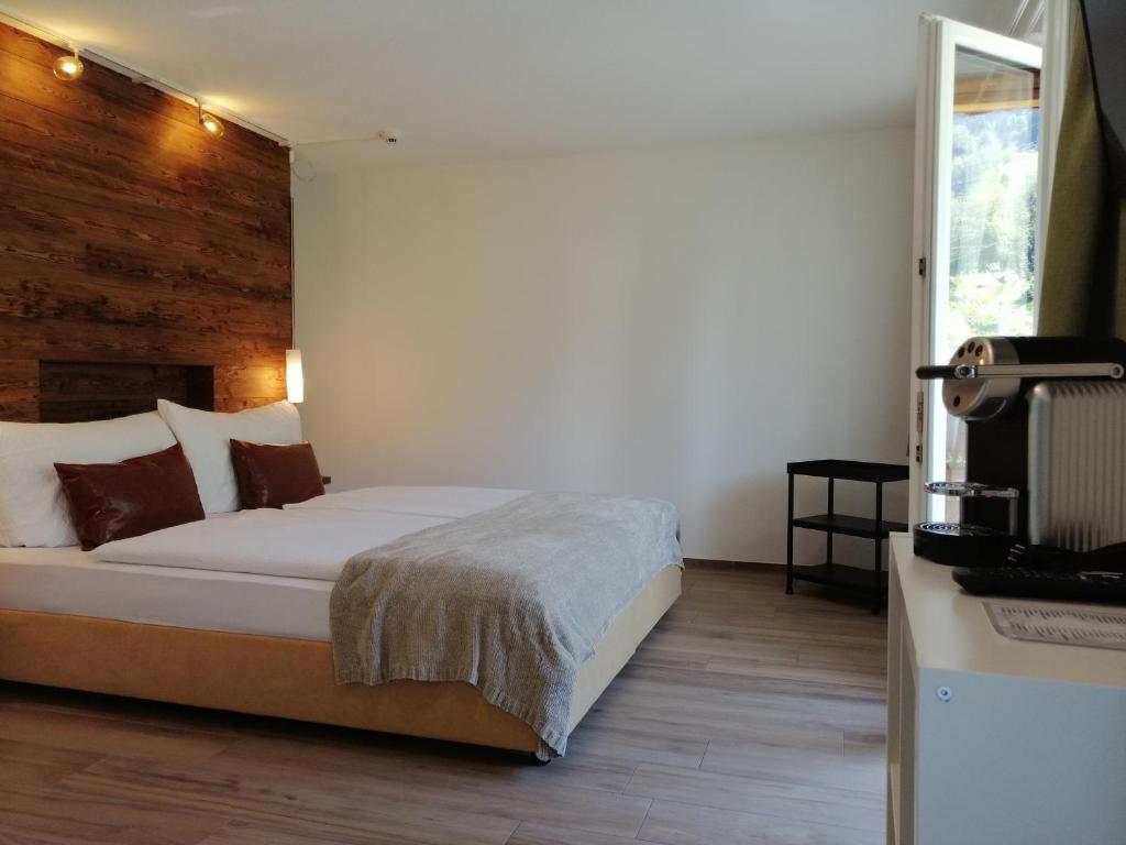 Postel nebo postele na pokoji v ubytování Hotel Restaurant Knobelboden