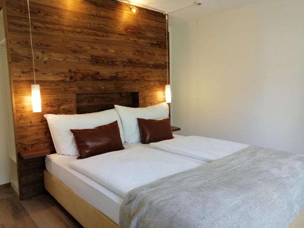 Postel nebo postele na pokoji v ubytování Hotel Restaurant Knobelboden