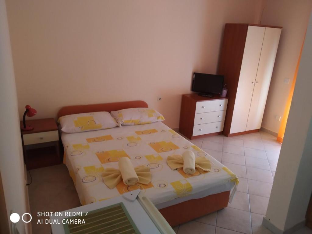 Posteľ alebo postele v izbe v ubytovaní Apartmani Glavina
