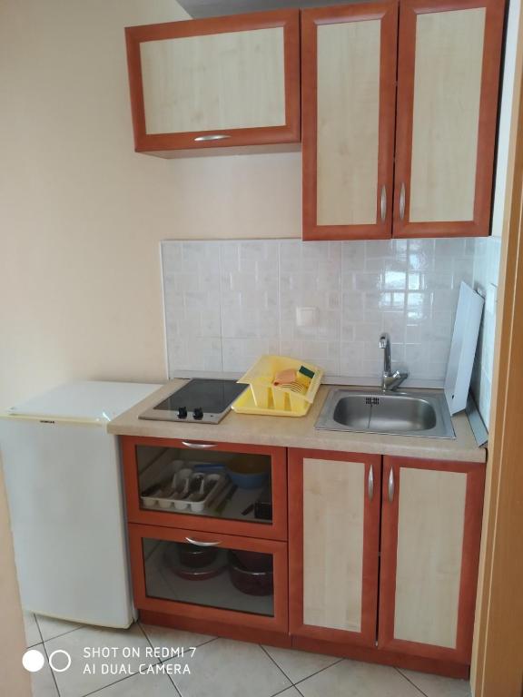 Kuchyňa alebo kuchynka v ubytovaní Apartmani Glavina