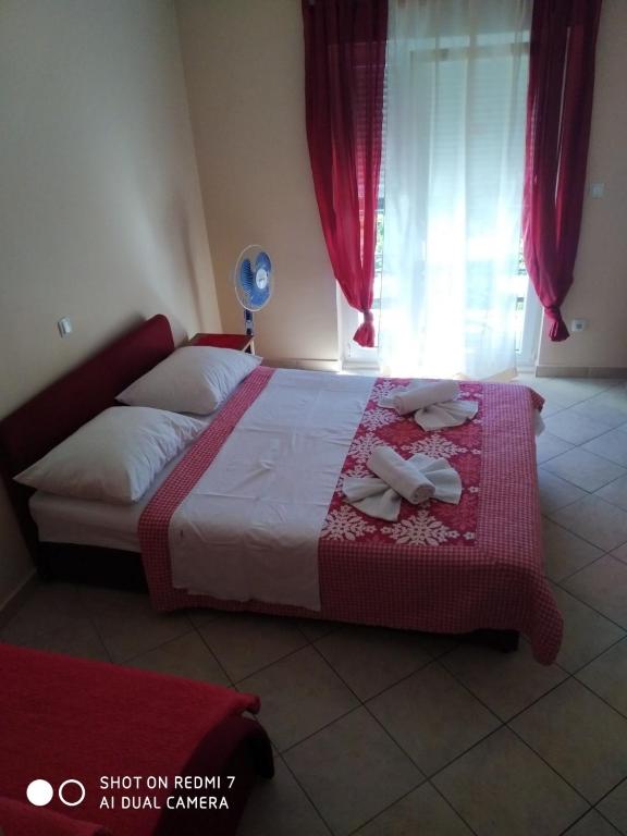 Posteľ alebo postele v izbe v ubytovaní Apartmani Glavina