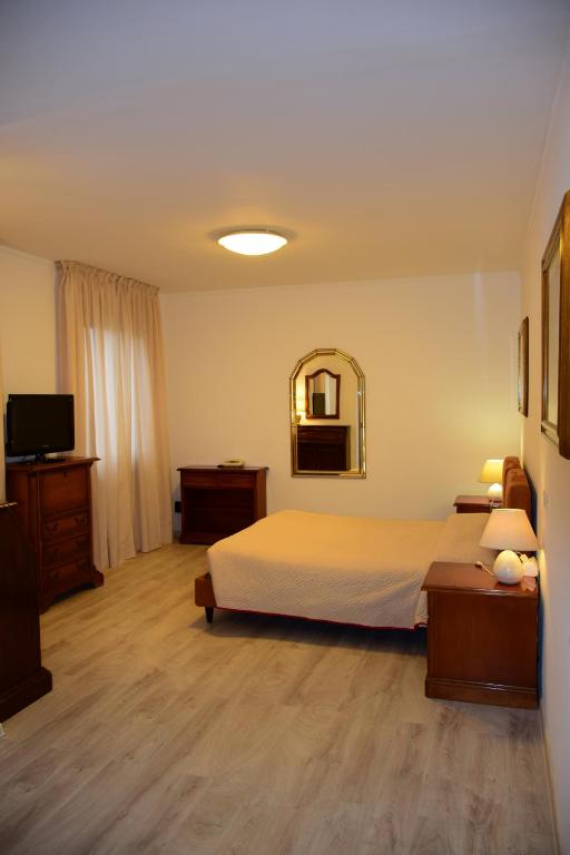 Postel nebo postele na pokoji v ubytování Park Hotel Elefante