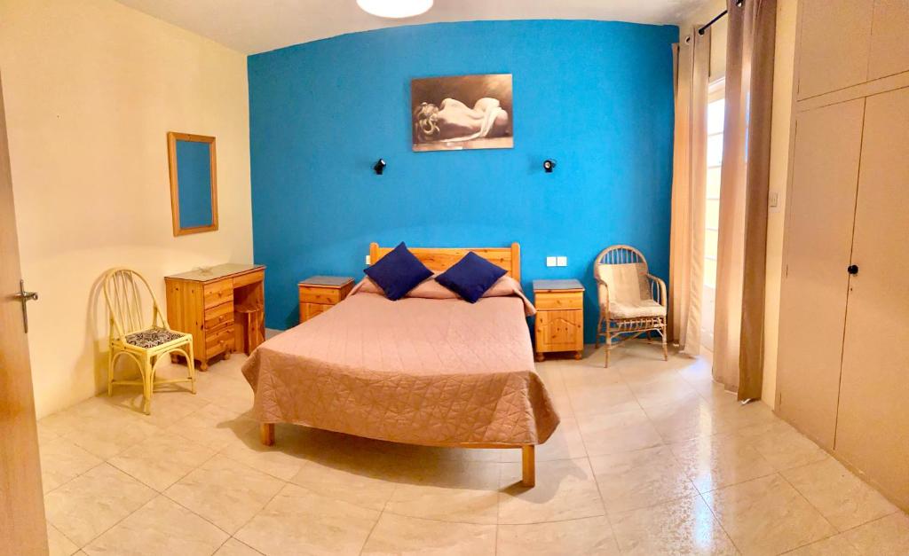Postel nebo postele na pokoji v ubytování Gozo Belle Mare Apartments