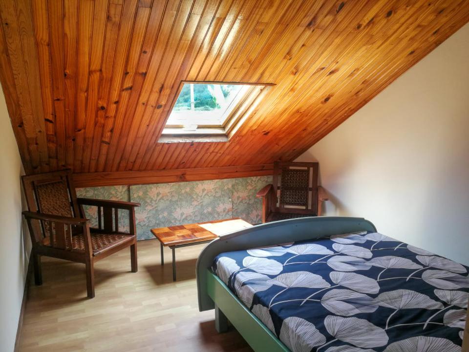 Postel nebo postele na pokoji v ubytování Gite etape chez Paule et jo