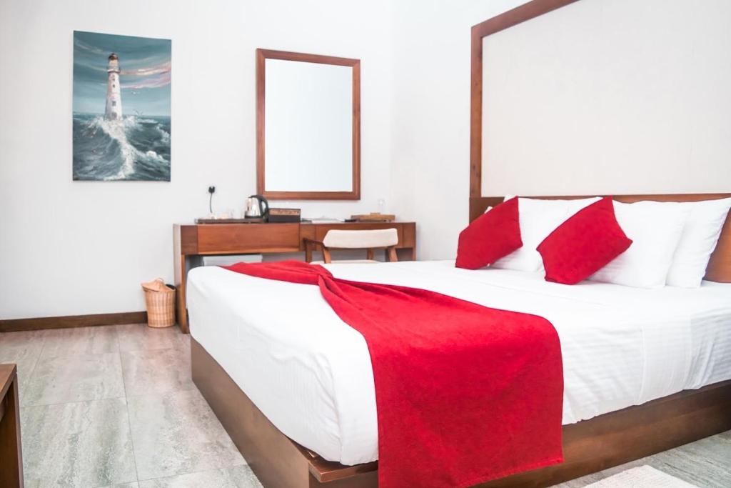 Postel nebo postele na pokoji v ubytování Tarshish Villa - Colombo