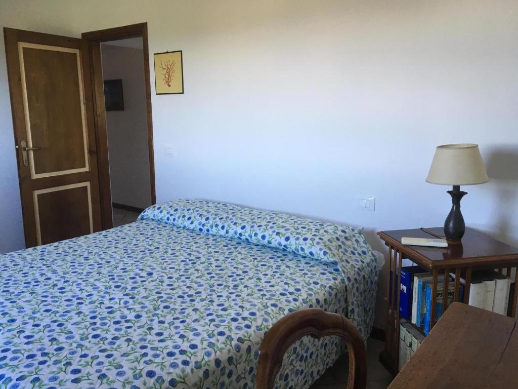Postel nebo postele na pokoji v ubytování Un Quadro Sulla Giannella