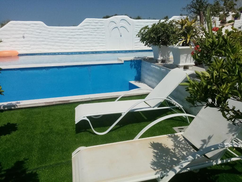 The swimming pool at or close to Maria's Apartments
