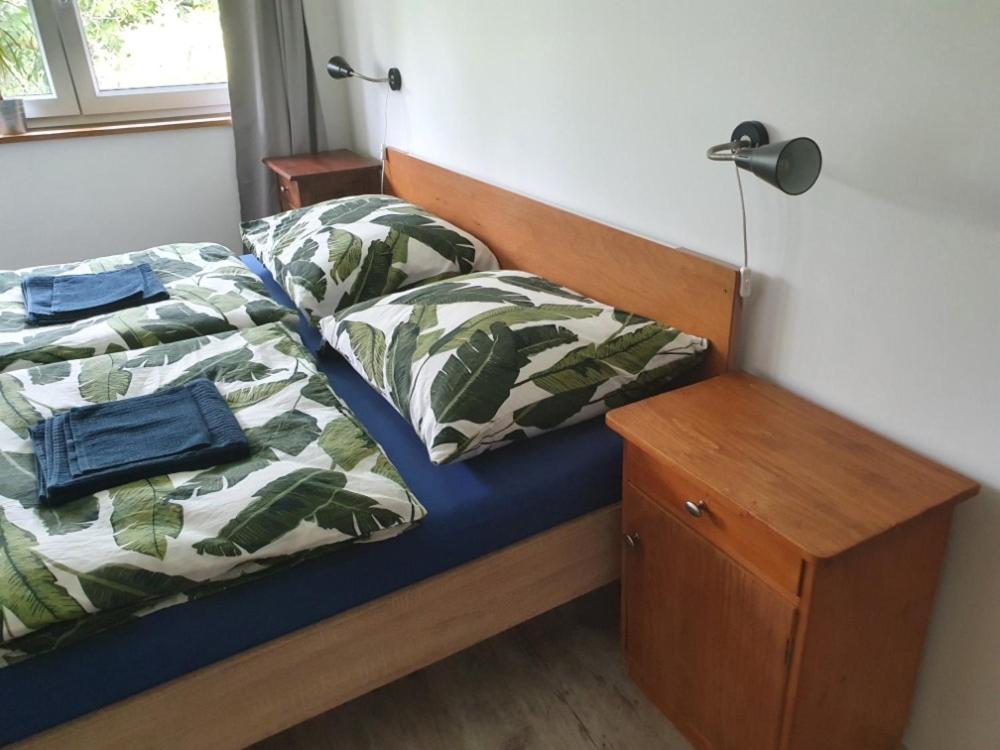 Postel nebo postele na pokoji v ubytování Apartmány Svatá