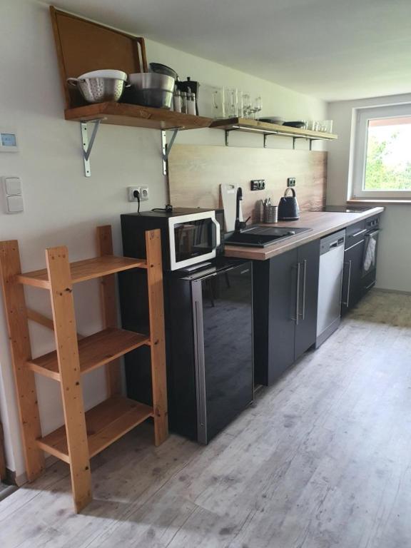 Kuchyň nebo kuchyňský kout v ubytování Apartmány Svatá