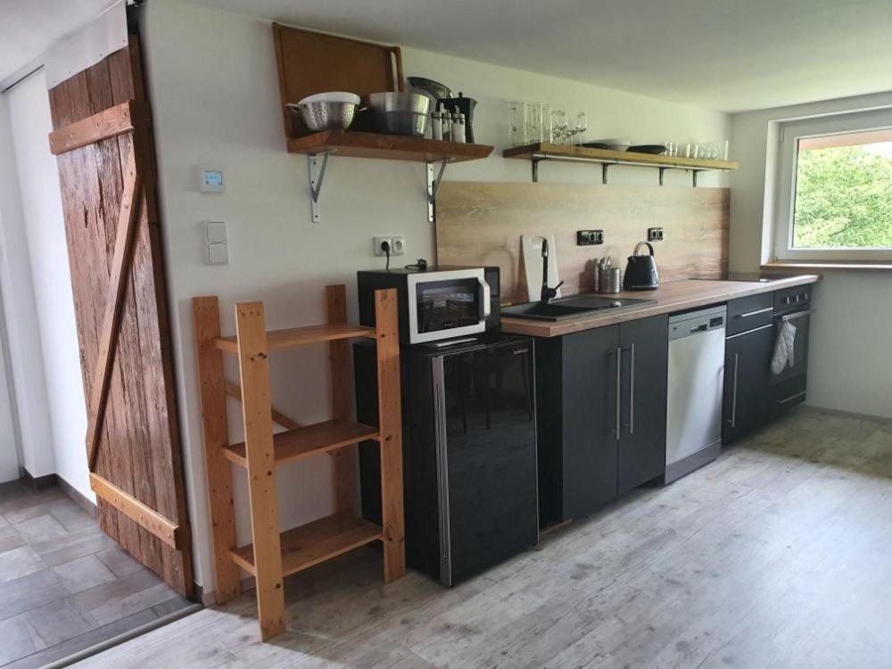 Kuchyň nebo kuchyňský kout v ubytování Apartmány Svatá
